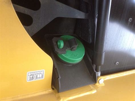 how to remove a catipilar skid steer fuel cap|cat skid steer water separator.